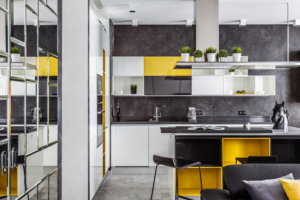 Design ideas for a medium sized contemporary galley open plan kitchen in Other with open cabinets, yellow cabinets, quartz worktops, grey splashback, ceramic flooring, an island, grey floors and white worktops.