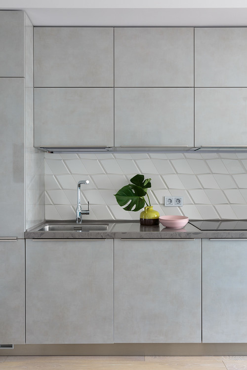 White 3D Backsplash with Light Gray Flat-Panel Cabinets: Where Minimalism Meets Luxury
