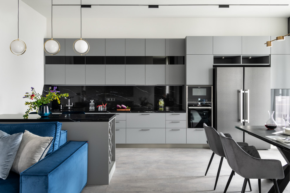 Esempio di una grande cucina contemporanea con pavimento in laminato e pavimento grigio