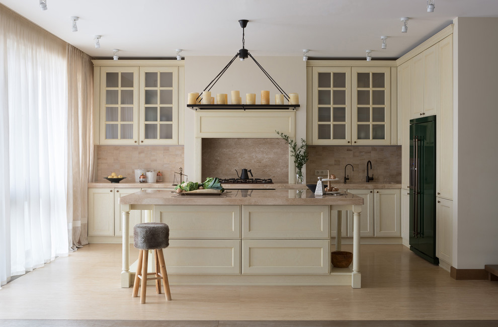 Traditional l-shaped kitchen/diner in Moscow with marble worktops, travertine splashback, travertine flooring, an island, recessed-panel cabinets, white cabinets, beige splashback, beige floors, beige worktops, coloured appliances and a submerged sink.