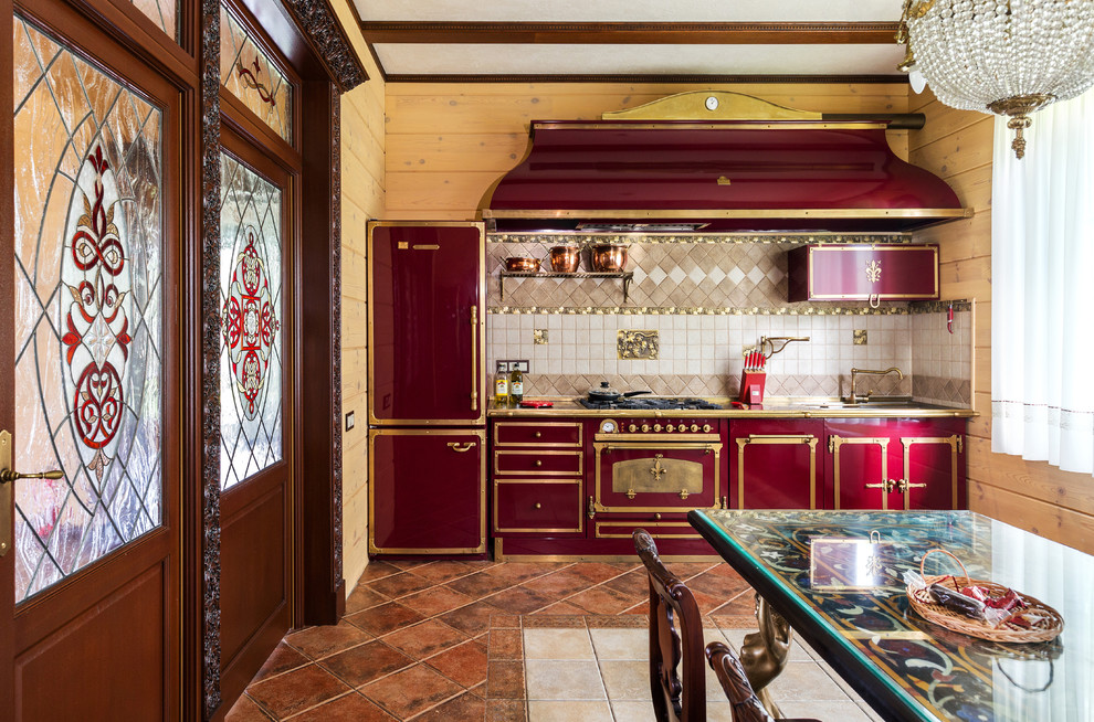 Example of a mid-sized classic single-wall ceramic tile and brown floor eat-in kitchen design in Moscow with no island, red cabinets, beige backsplash and colored appliances