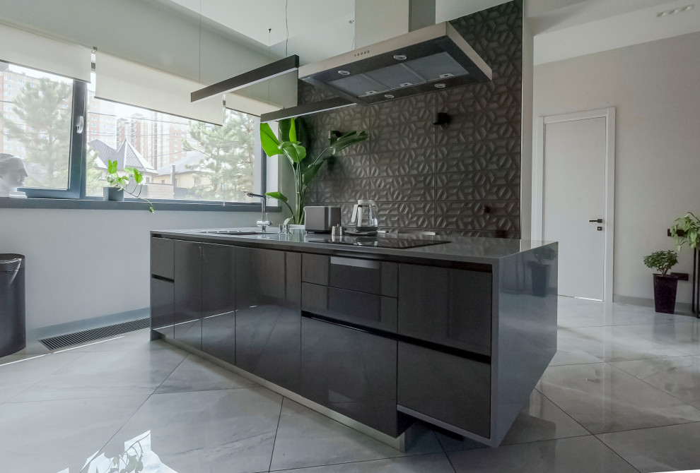 This is an example of a medium sized contemporary galley kitchen/diner in Other with a submerged sink, flat-panel cabinets, grey cabinets, composite countertops, stainless steel appliances, porcelain flooring, an island, grey floors and grey worktops.