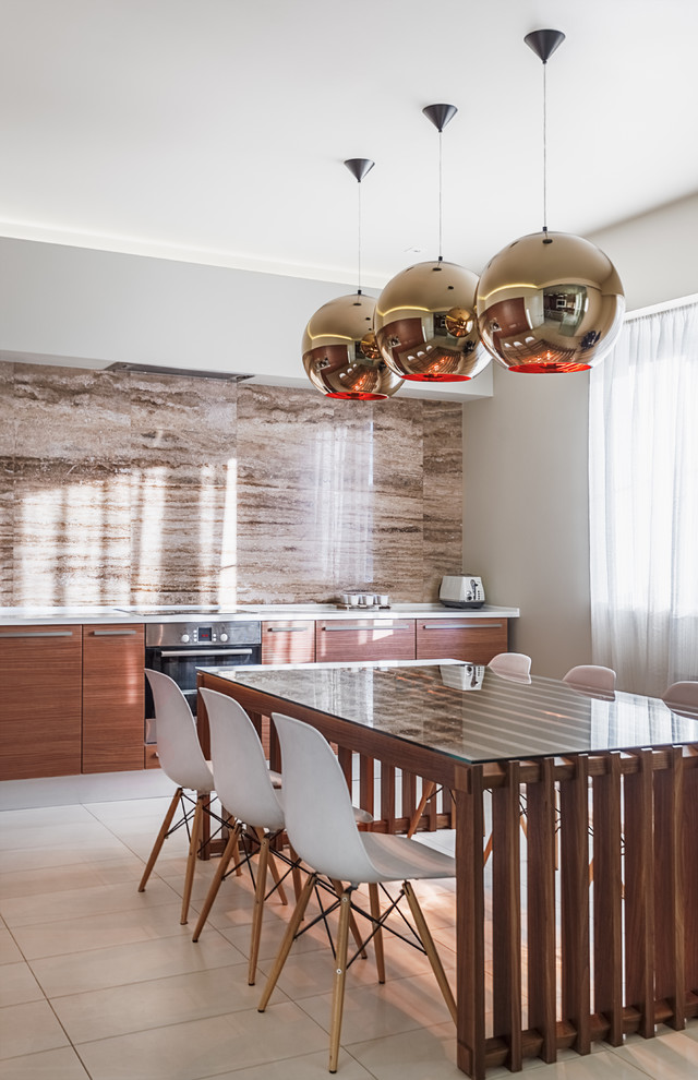 This is an example of a contemporary enclosed kitchen in Moscow with flat-panel cabinets, medium wood cabinets, multi-coloured splashback, porcelain flooring and white floors.