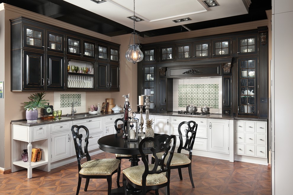 Medium sized traditional u-shaped enclosed kitchen in Moscow with raised-panel cabinets, composite countertops, stainless steel appliances and grey cabinets.