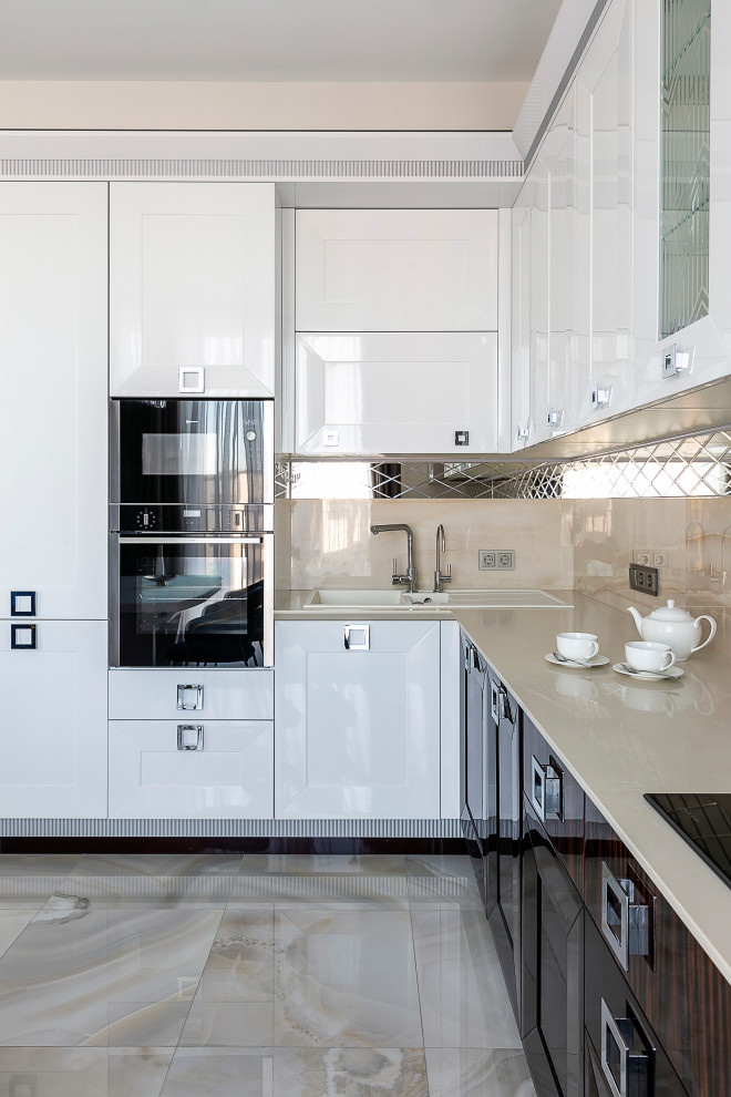 This is an example of a medium sized classic l-shaped open plan kitchen in Moscow with a built-in sink, recessed-panel cabinets, white cabinets, engineered stone countertops, beige splashback, porcelain splashback, integrated appliances, porcelain flooring, no island, white floors, beige worktops and a drop ceiling.