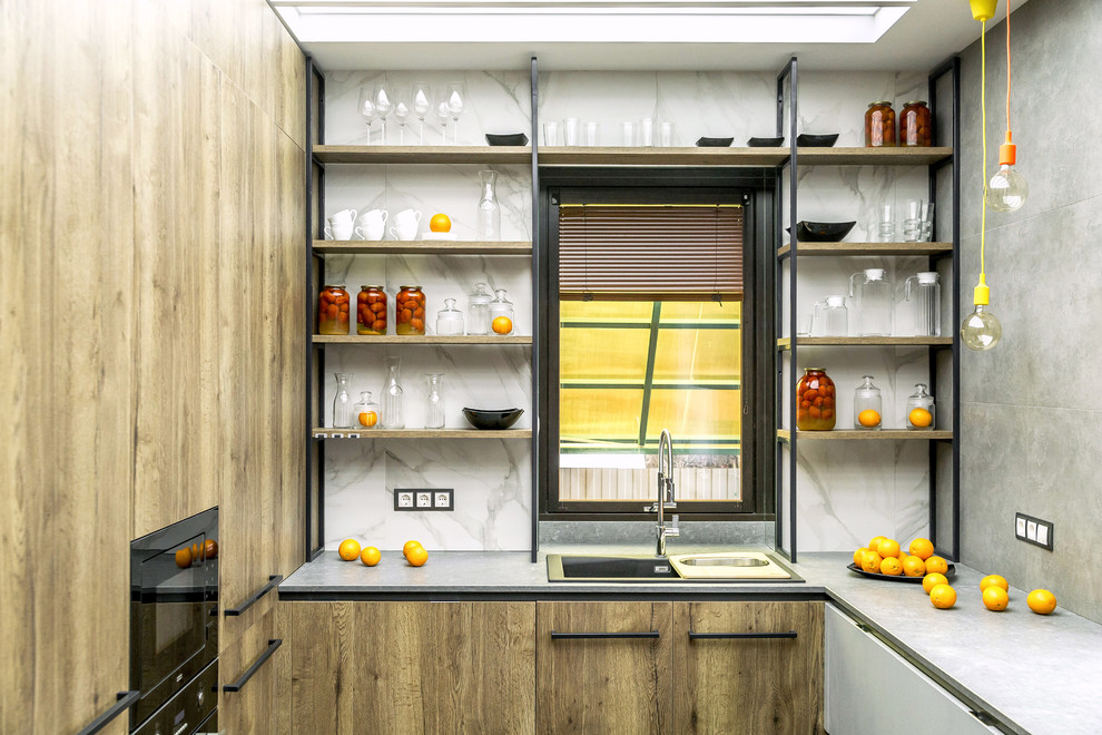Eat-in kitchen - contemporary u-shaped eat-in kitchen idea in Moscow