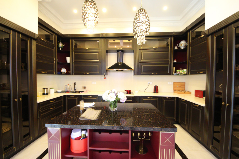 Large eclectic u-shaped enclosed kitchen in Moscow with a double-bowl sink, recessed-panel cabinets, black cabinets, composite countertops, beige splashback, porcelain splashback, black appliances, porcelain flooring, an island, white floors, beige worktops and a drop ceiling.