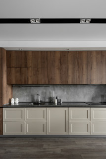 Photo of a beige kitchen with dark worktop on Craiyon