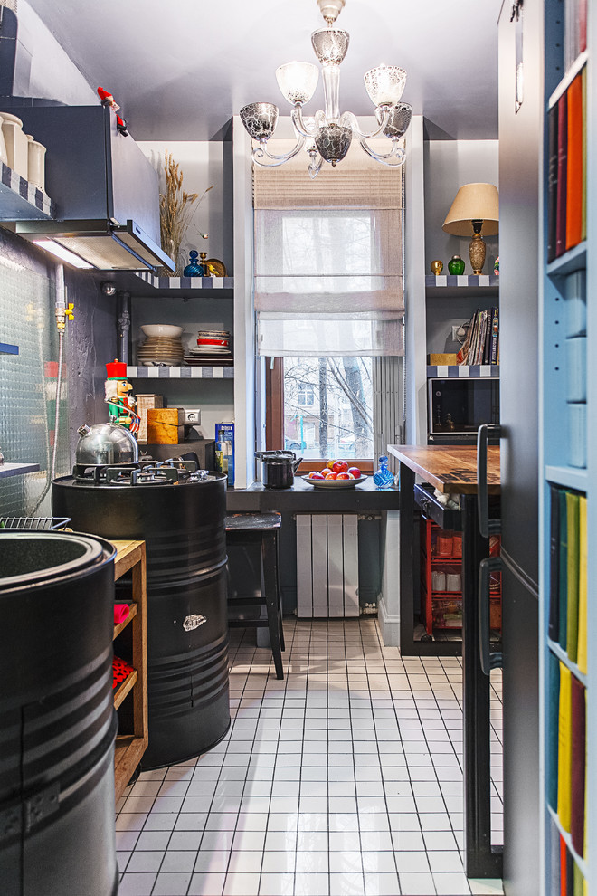 На фото: узкая кухня в стиле лофт с накладной мойкой