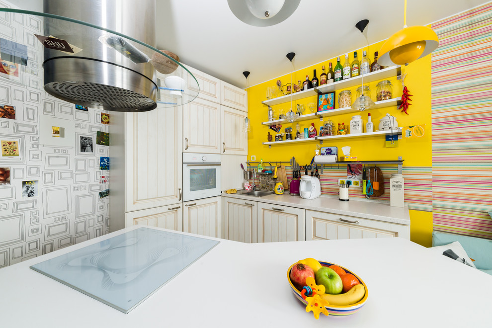 Photo of a bohemian kitchen in Saint Petersburg with a feature wall.