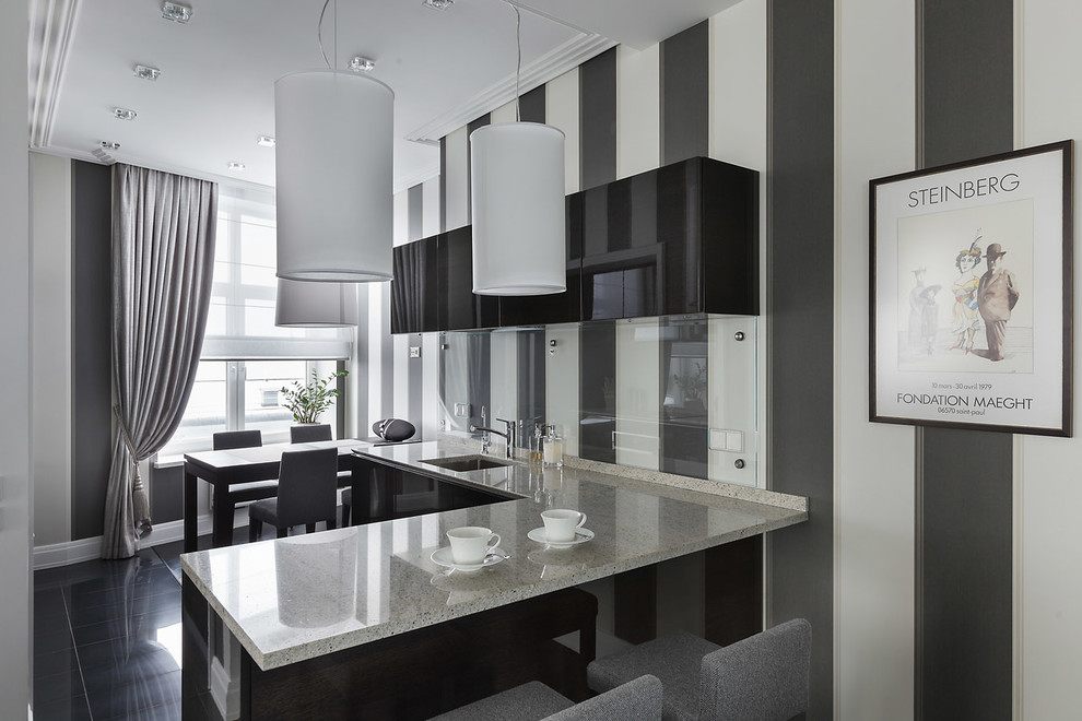 Стильный дизайн: кухня в современном стиле с черно-белыми фасадами - последний тренд