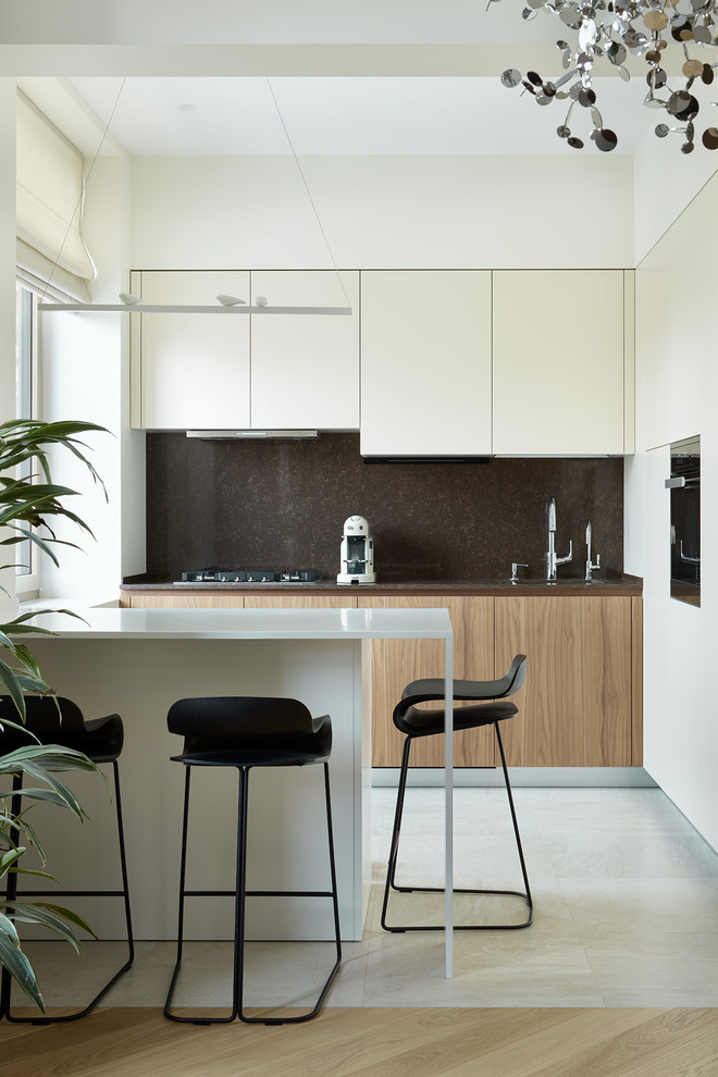 Contemporary l-shaped open plan kitchen in Moscow with flat-panel cabinets, light wood cabinets, brown splashback, an island, white floors and brown worktops.