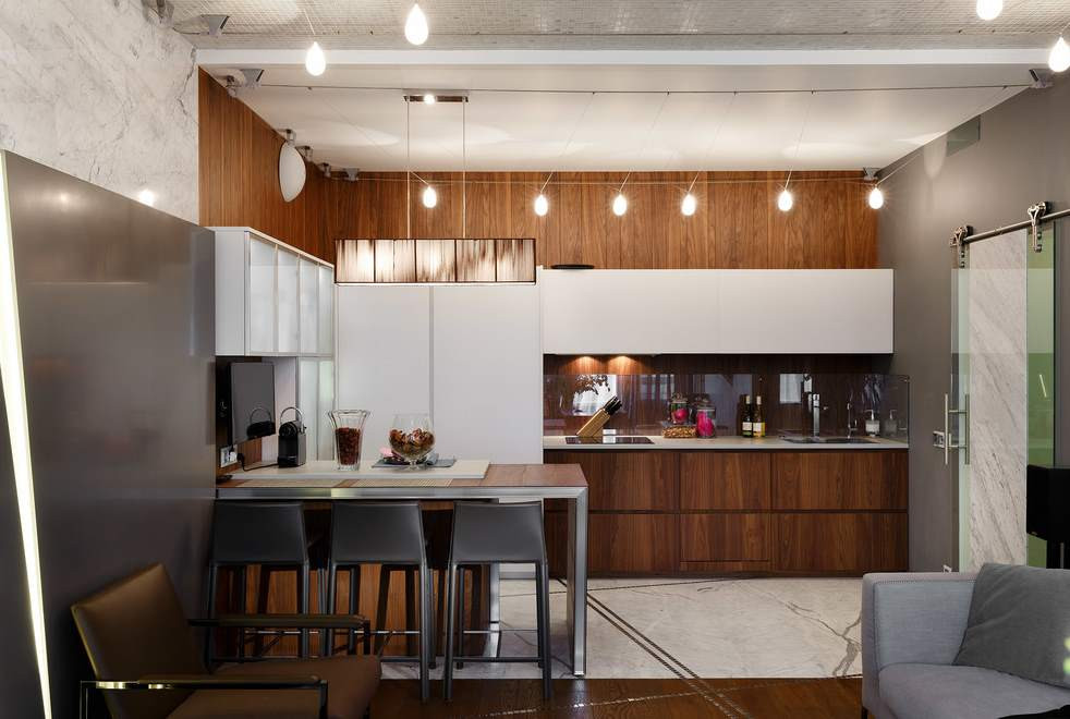 Example of a small trendy l-shaped gray floor open concept kitchen design in Moscow with flat-panel cabinets, wood backsplash and a peninsula