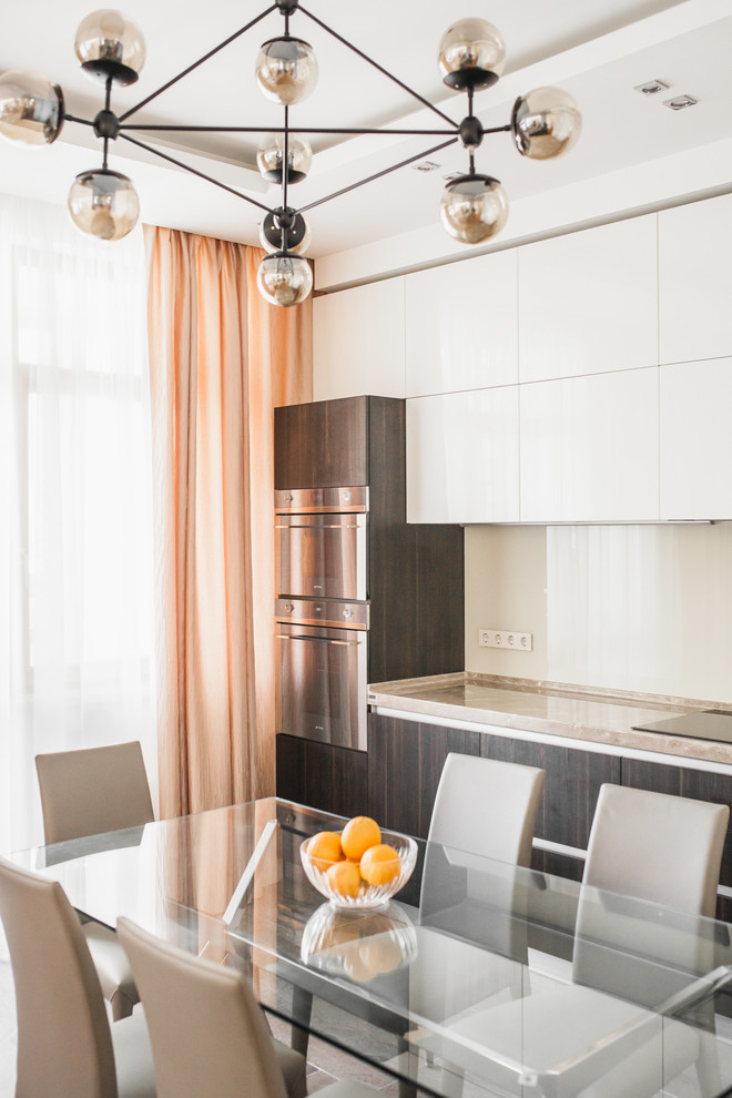 This is an example of a medium sized contemporary kitchen in Moscow.