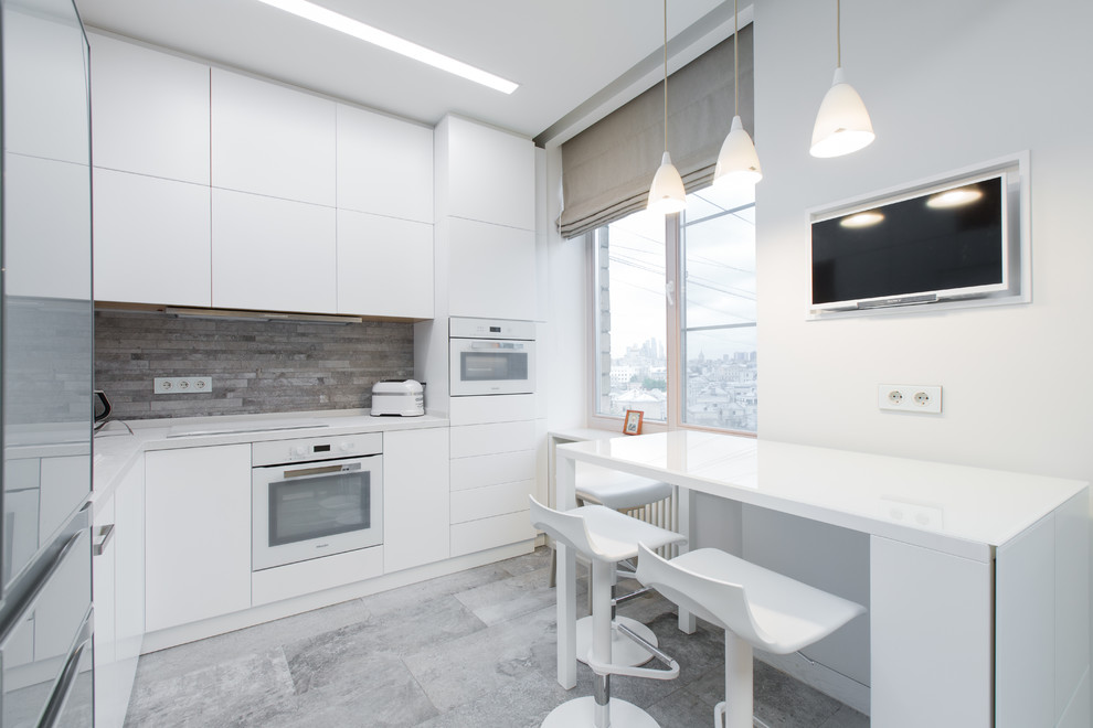 Inspiration for a mid-sized contemporary l-shaped porcelain tile open concept kitchen remodel in Moscow with an undermount sink, flat-panel cabinets, white cabinets, quartz countertops, gray backsplash, porcelain backsplash, white appliances and no island