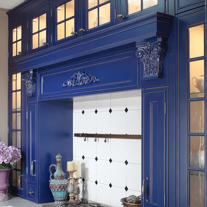 Photo of a small traditional l-shaped kitchen in Moscow with raised-panel cabinets, white appliances and blue cabinets.