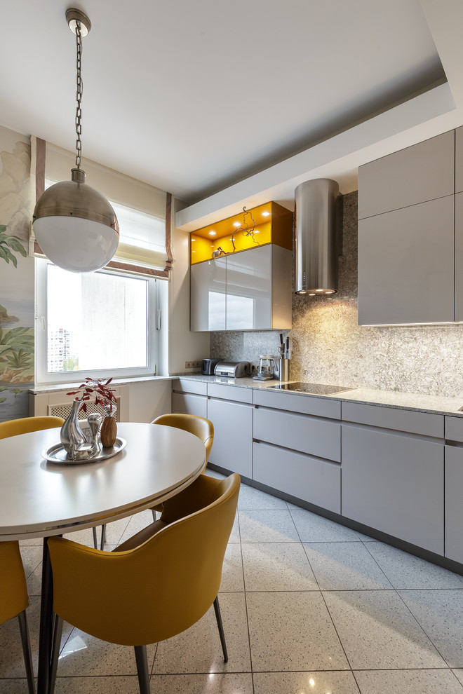 Inspiration for a contemporary single-wall enclosed kitchen in Moscow with flat-panel cabinets, grey cabinets, grey splashback, no island, grey floors and grey worktops.