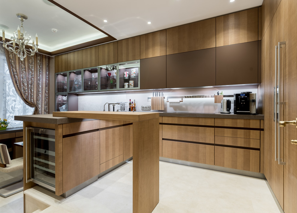 Design ideas for a contemporary u-shaped kitchen in Moscow with flat-panel cabinets, medium wood cabinets, white splashback and a breakfast bar.