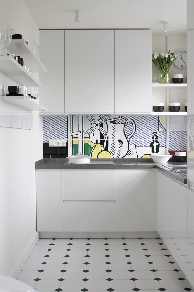 Example of a trendy l-shaped multicolored floor eat-in kitchen design in Moscow with a drop-in sink, flat-panel cabinets, white cabinets, multicolored backsplash, no island and gray countertops