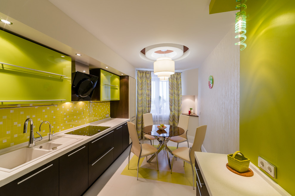 Inspiration for a contemporary kitchen in Moscow with green cabinets.
