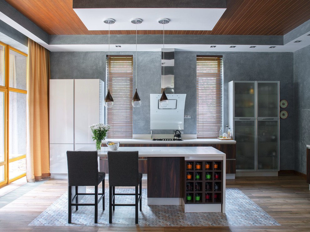This is an example of a large contemporary single-wall open plan kitchen in Moscow with a submerged sink, flat-panel cabinets, dark wood cabinets, composite countertops, grey splashback, stainless steel appliances, porcelain flooring and an island.