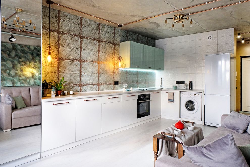 Example of a small urban single-wall laminate floor and white floor open concept kitchen design in Novosibirsk with flat-panel cabinets, white cabinets and glass sheet backsplash
