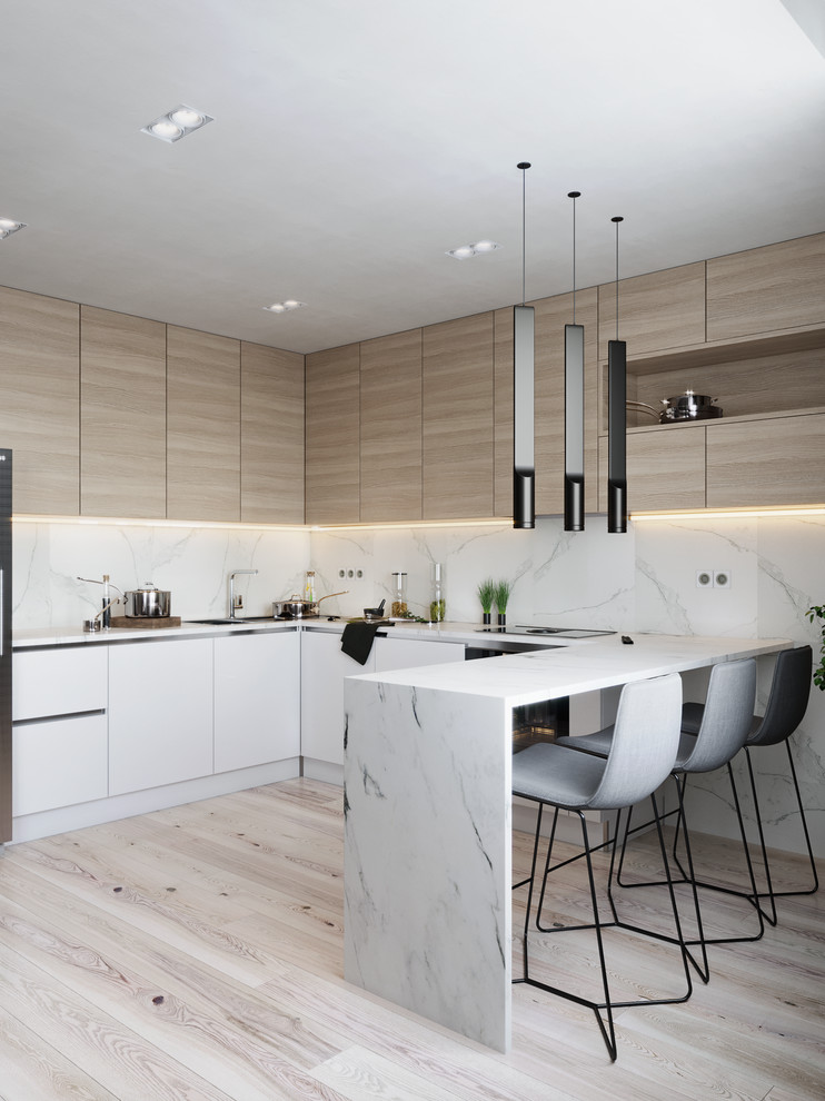 Kitchen - mid-sized contemporary u-shaped light wood floor and beige floor kitchen idea in Valencia with flat-panel cabinets, marble countertops, white backsplash, marble backsplash, white countertops, a double-bowl sink, light wood cabinets and a peninsula