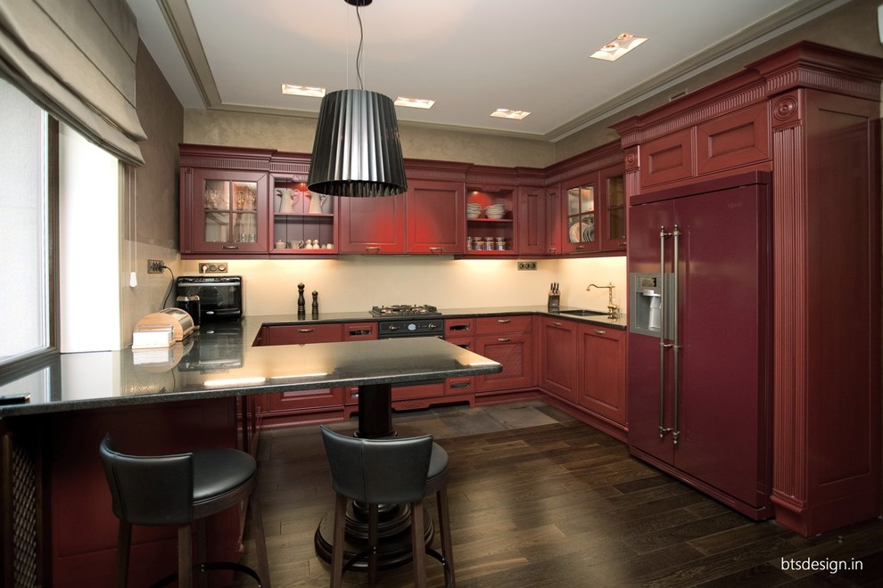 Large transitional l-shaped painted wood floor and brown floor eat-in kitchen photo in Other with an undermount sink, recessed-panel cabinets, white backsplash, porcelain backsplash, colored appliances and an island