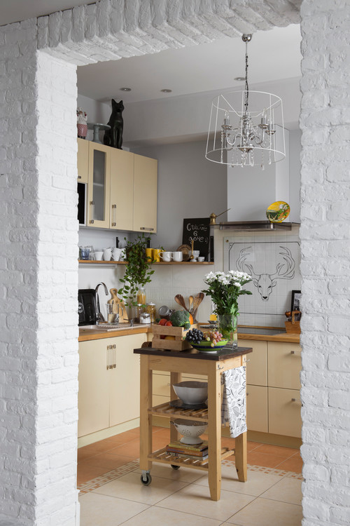 Pastel Yellow Kitchen Cabinets: Sunshine in a Cozy Kitchen