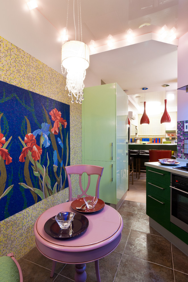 Enclosed kitchen - small eclectic l-shaped ceramic tile enclosed kitchen idea in Moscow with an integrated sink, flat-panel cabinets, green cabinets, solid surface countertops, multicolored backsplash, mosaic tile backsplash, paneled appliances and no island