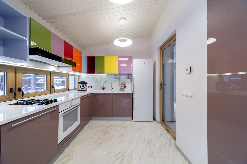 Photo of a contemporary l-shaped enclosed kitchen in Moscow with flat-panel cabinets and no island.
