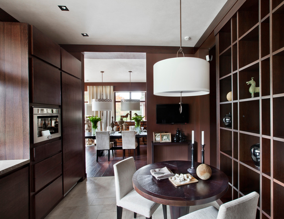 Kitchen/diner in Moscow with porcelain flooring.