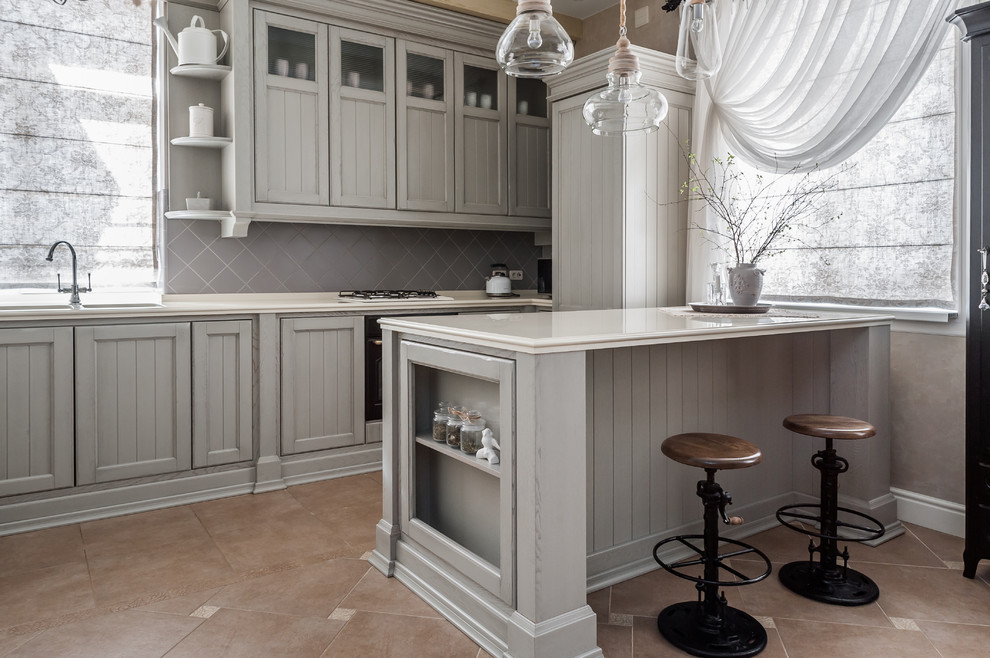 Design ideas for a medium sized traditional single-wall kitchen/diner in Other with a submerged sink, grey cabinets, composite countertops, grey splashback, cement tile splashback, black appliances, ceramic flooring, an island, brown floors, beige worktops and shaker cabinets.