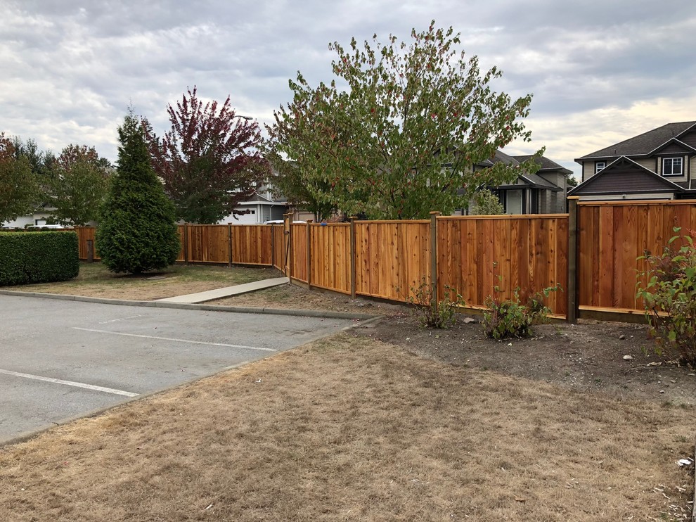 1 grade cedar overlap board panels + pre stain 200+ linear feet