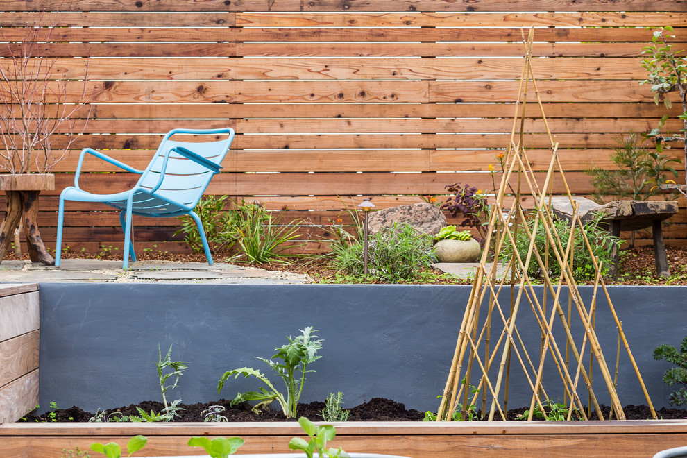 Photo of a contemporary backyard vegetable garden landscape in San Francisco.