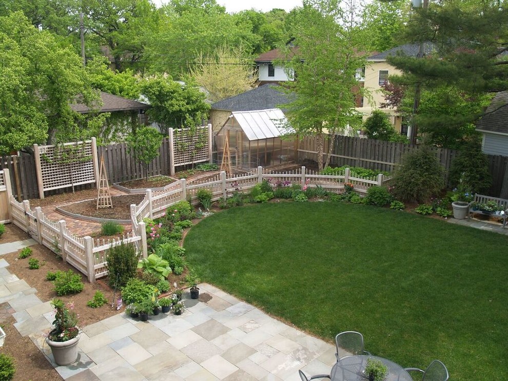 This is an example of a modern backyard stone garden path in Minneapolis.