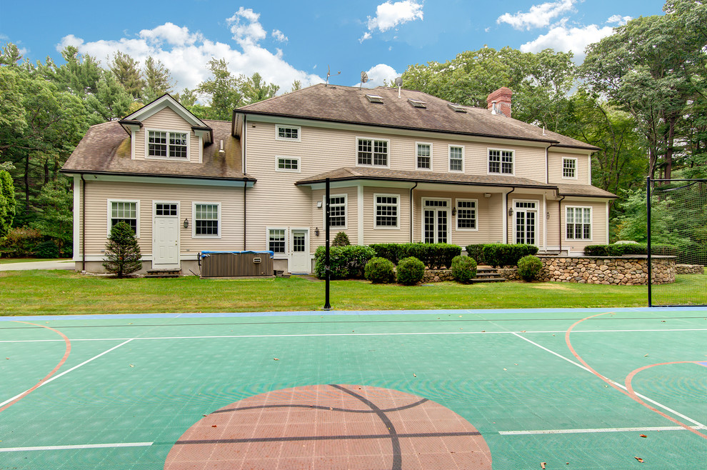Design ideas for an expansive classic back garden in Boston with an outdoor sport court.