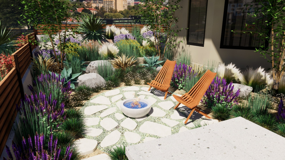 Imagen de jardín de secano mediterráneo pequeño en primavera en patio delantero con brasero, exposición parcial al sol, adoquines de piedra natural y con madera
