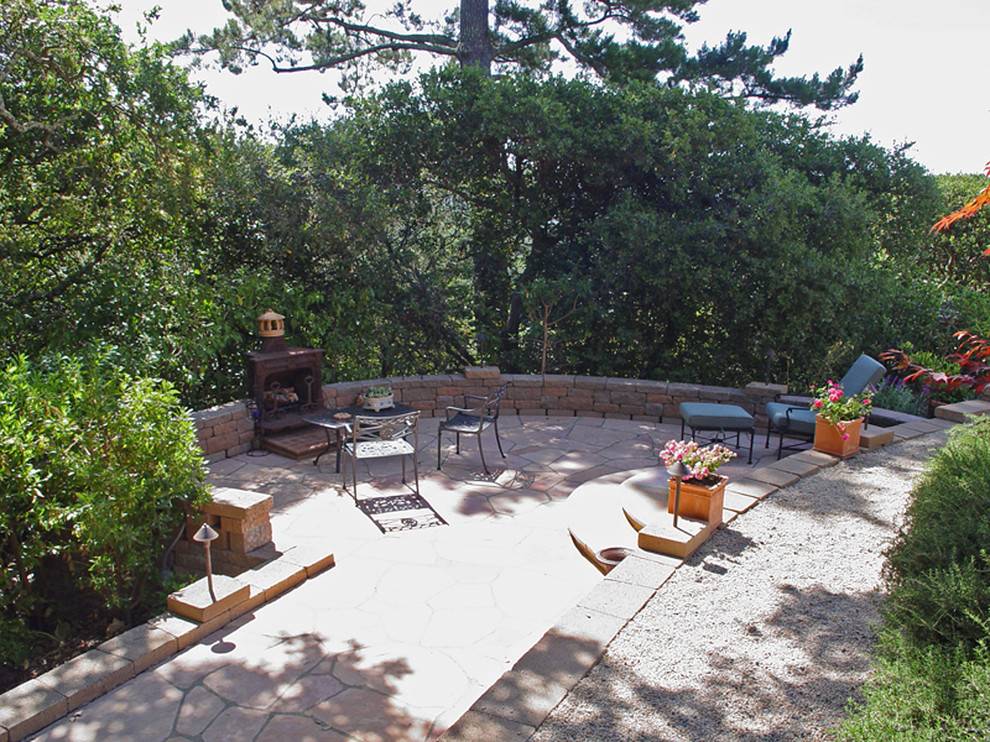 This is an example of a large mediterranean backyard stone landscaping in San Francisco.