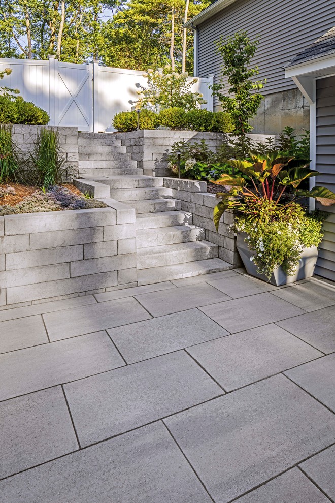 Design ideas for a large contemporary garden in Other with concrete paving.