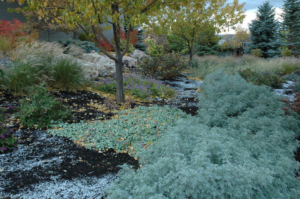 This is an example of a large traditional drought-tolerant and full sun front yard concrete paver garden path in Salt Lake City for fall.