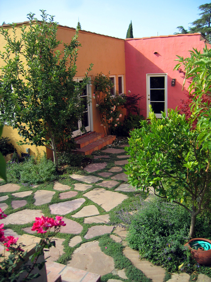 This is an example of a mediterranean courtyard landscaping in Santa Barbara.
