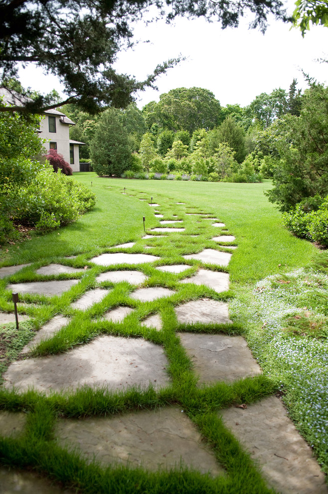 Inspiration for a contemporary back garden in New York with natural stone paving.
