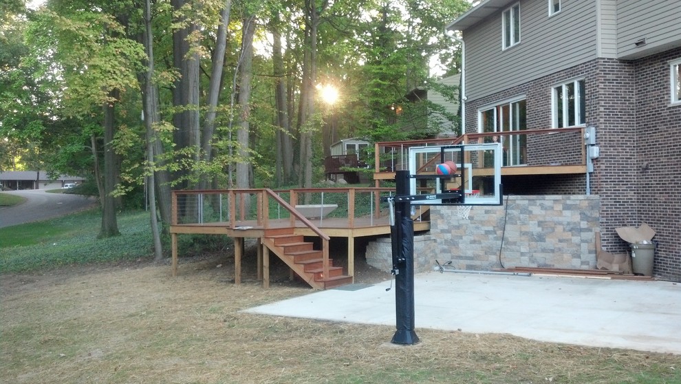 This is an example of a large traditional partial sun front yard outdoor sport court in Indianapolis.