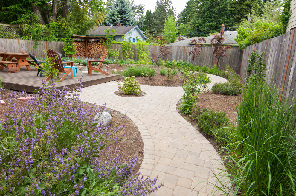 Design ideas for a small eclectic drought-tolerant and partial sun backyard stone garden path in Portland for summer.