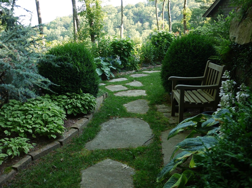 Inspiration for a hillside stone garden path in Other.