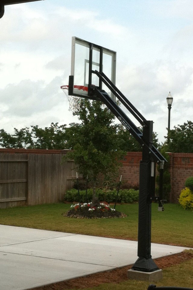 Andrew T's Pro Dunk Silver Basketball System on a 20x25 in Sugarland