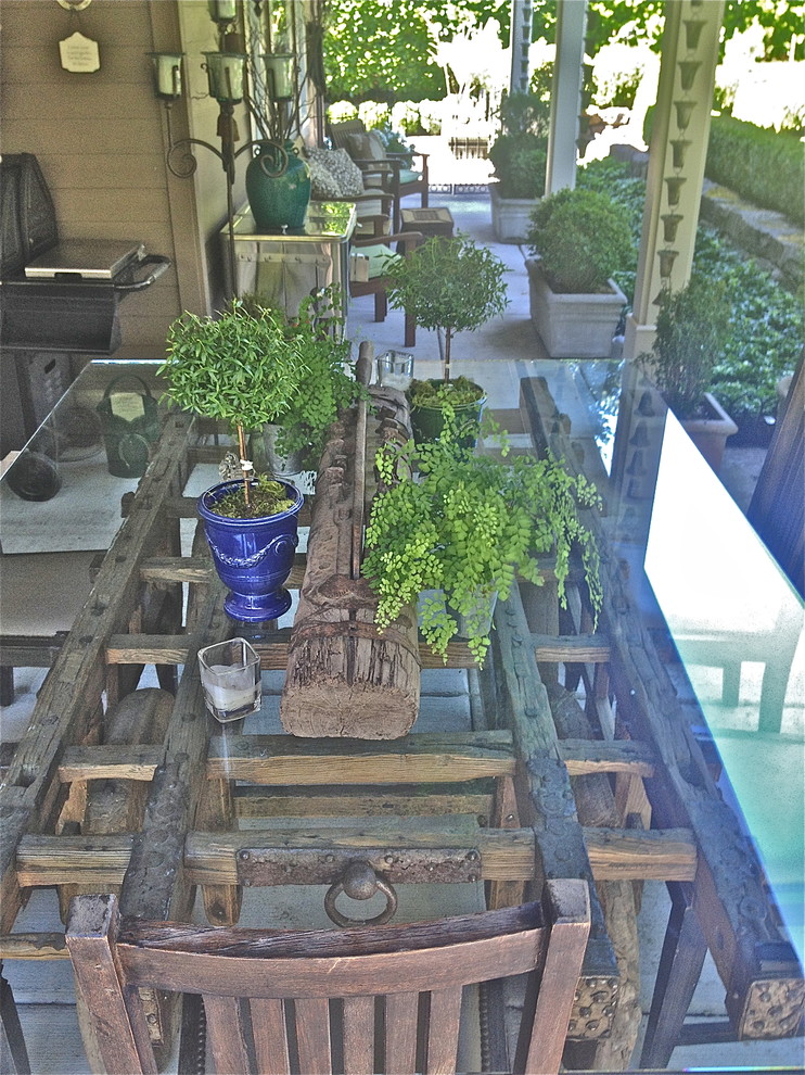This is an example of a large traditional backyard stone landscaping in Portland.