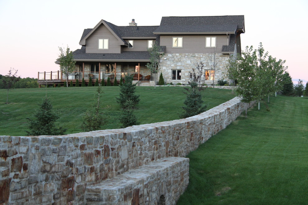 This is an example of an expansive traditional back garden wall in Ottawa.