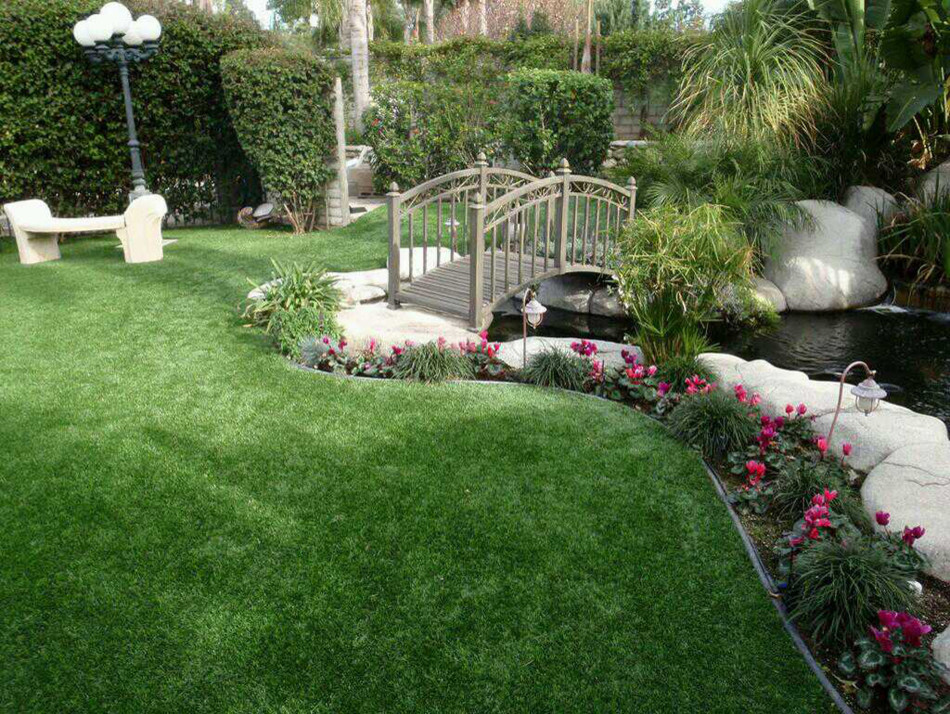 Design ideas for a medium sized world-inspired back formal partial sun garden in Los Angeles with a pond and natural stone paving.